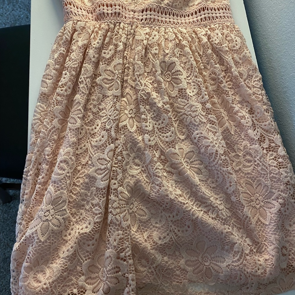 This is a beautiful dress in a lovely rose color